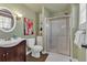 Charming bathroom features a walk-in shower, stylish vanity with storage, and neutral-colored walls at 577 Alexander Farms Sw Vw, Marietta, GA 30064