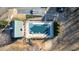 Aerial view of community pool area, partially covered for off-season, surrounded by mature trees at 577 Alexander Farms Sw Vw, Marietta, GA 30064