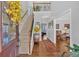 Grand foyer with a staircase, hardwood floors, chandelier, and view into the formal living room at 577 Alexander Farms Sw Vw, Marietta, GA 30064