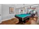 Finished basement game room featuring a pool table and seating area at 577 Alexander Farms Sw Vw, Marietta, GA 30064