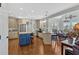 Bright kitchen featuring stainless steel appliances, hardwood floors, and a granite-topped island at 577 Alexander Farms Sw Vw, Marietta, GA 30064