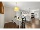 Charming dining area with hardwood floors adjacent to an open concept kitchen at 1147 Longshore Dr, Decatur, GA 30032