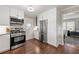 Well-equipped kitchen featuring stainless steel appliances, white cabinets, and a functional layout at 1147 Longshore Dr, Decatur, GA 30032