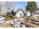 Charming home with a lovely front yard, walkway, and delightful outdoor seating at 4210 Gatewood Ln, Peachtree Corners, GA 30097