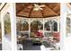 Gazebo featuring plush seating, elegant decor, and a beautiful wood ceiling at 4210 Gatewood Ln, Peachtree Corners, GA 30097