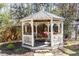 Gazebo with comfortable seating and elegant design, perfect for outdoor relaxation at 4210 Gatewood Ln, Peachtree Corners, GA 30097