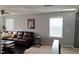 Cozy bonus room with dark floors and natural light streaming through the blinds at 4402 Alysheba Dr, Fairburn, GA 30213