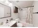 Well-lit bathroom with vanity, mirror, and shower at 1284 To Lani Path, Stone Mountain, GA 30083