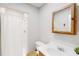 Classic bathroom featuring white shower, a vanity and a framed mirror at 1284 To Lani Path, Stone Mountain, GA 30083