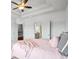 Spacious bedroom with a ceiling fan and attached bathroom and closet at 1923 Skyfall Ne Cir, Atlanta, GA 30319