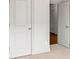 Bedroom with a large closet that offers ample storage space and neutral carpet flooring at 1923 Skyfall Ne Cir, Atlanta, GA 30319