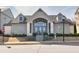 Community clubhouse featuring a modern design and a welcoming entrance with brick accents at 1923 Skyfall Ne Cir, Atlanta, GA 30319