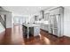 Modern kitchen with stainless steel appliances, gray cabinetry, and a large island with seating at 1923 Skyfall Ne Cir, Atlanta, GA 30319