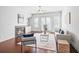 Comfortable living room featuring a fireplace, built-in shelving, and large windows for natural light at 1923 Skyfall Ne Cir, Atlanta, GA 30319