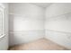 Empty walk-in closet with wire shelving and carpet at 1923 Skyfall Ne Cir, Atlanta, GA 30319