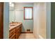 Bathroom featuring a tub with shower, large vanity with granite countertop, and neutral tile flooring at 2191 Spear Point Dr, Marietta, GA 30062