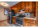 Beautiful kitchen featuring stainless steel appliances, tile floors, and granite countertops at 2191 Spear Point Dr, Marietta, GA 30062