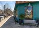 Oakview coffee shop featuring a vibrant turquoise facade, bench seating, and large, inviting storefront windows at 231 Sisson Ne Ave, Atlanta, GA 30317