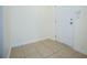 Entryway with tile floor, a white front door, and neutral-colored walls at 2326 Bigwood Trl, Atlanta, GA 30349