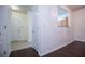 View of the entryway to the home with tile flooring and access to the kitchen at 2326 Bigwood Trl, Atlanta, GA 30349
