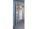 Hallway with multiple doors leading to other rooms, lit by ceiling lights at 2326 Bigwood Trl, Atlanta, GA 30349