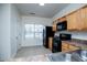 A bright, functional kitchen with standard appliances and well-lit countertops at 2326 Bigwood Trl, Atlanta, GA 30349