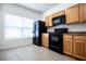Kitchen featuring ample cabinets, modern appliances, and bright natural lighting at 2326 Bigwood Trl, Atlanta, GA 30349