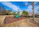 Community playground featuring slides, swings, and climbing equipment at 2326 Bigwood Trl, Atlanta, GA 30349