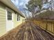 Backyard featuring a patio deck with some leaves on it at 2056 Merle Se Dr, Conyers, GA 30013