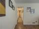 Hallway featuring hardwood floors and natural lighting at 2056 Merle Se Dr, Conyers, GA 30013