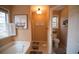 Bright bathroom with a tub, shower, and separate toilet room, offering functionality and style at 392 Summerfield Xing, Acworth, GA 30101