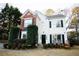 Charming two-story home with black shutters, front garden, and welcoming front door at 392 Summerfield Xing, Acworth, GA 30101