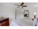 Cozy bedroom featuring a ceiling fan, closet, and desk at 4422 Wellington Ter, Decatur, GA 30035