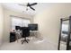 Functional office featuring a ceiling fan, carpet, and ample space for work at 1945 Bay Beauty Ln # 10, Austell, GA 30106