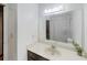 Bright bathroom featuring a large mirror, a shower-tub combo, and a single sink vanity at 2284 Emerald Springs Dr, Decatur, GA 30035