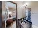 This bathroom features an eclectic mirror, a vintage vanity, and view into the adjacent bedroom at 2284 Emerald Springs Dr, Decatur, GA 30035