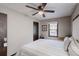 This bedroom features a window that allows for ample natural lighting and plush gray carpeting at 2284 Emerald Springs Dr, Decatur, GA 30035