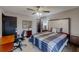 This bedroom features a window that allows for ample natural lighting and plush gray carpeting at 2284 Emerald Springs Dr, Decatur, GA 30035