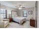 This bedroom features three windows that allow for ample natural lighting and plush gray carpeting at 2284 Emerald Springs Dr, Decatur, GA 30035