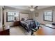 This bedroom features a window that allows for ample natural lighting and plush gray carpeting at 2284 Emerald Springs Dr, Decatur, GA 30035