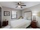 This bedroom features a window that allows for ample natural lighting and plush gray carpeting at 2284 Emerald Springs Dr, Decatur, GA 30035