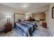 Bedroom with a luxurious headboard, a desk, and a bed at 2284 Emerald Springs Dr, Decatur, GA 30035