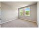 Neutral bedroom featuring plush carpet, bright windows, and a calming color scheme at 2460 Hidden Creek Rd, Kennesaw, GA 30152