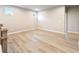 Open loft area featuring durable hardwood floors and bright neutral paint at 2460 Hidden Creek Rd, Kennesaw, GA 30152