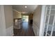 Hallway featuring luxury vinyl plank flooring that leads to the kitchen at 3924 Veracruz Dr, Decatur, GA 30034