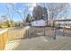 View from the back deck to the back of the property, which includes an external shed at 765 Shellnut Dr, Forest Park, GA 30297