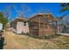 Exterior angle view featuring a charming covered porch, fresh landscaping, and convenient parking space at 1826 Terry Mill Se Rd, Atlanta, GA 30316