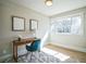 Bright home office with a large window, desk, stylish chair, and natural light at 1826 Terry Mill Se Rd, Atlanta, GA 30316