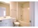 Bright bathroom featuring vanity, tub, shower, and neutral color scheme at 1480 Baygreen Rd, Suwanee, GA 30024