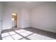 Spacious bedroom with neutral decor, featuring two closets and an adjoining bathroom for added convenience at 1480 Baygreen Rd, Suwanee, GA 30024